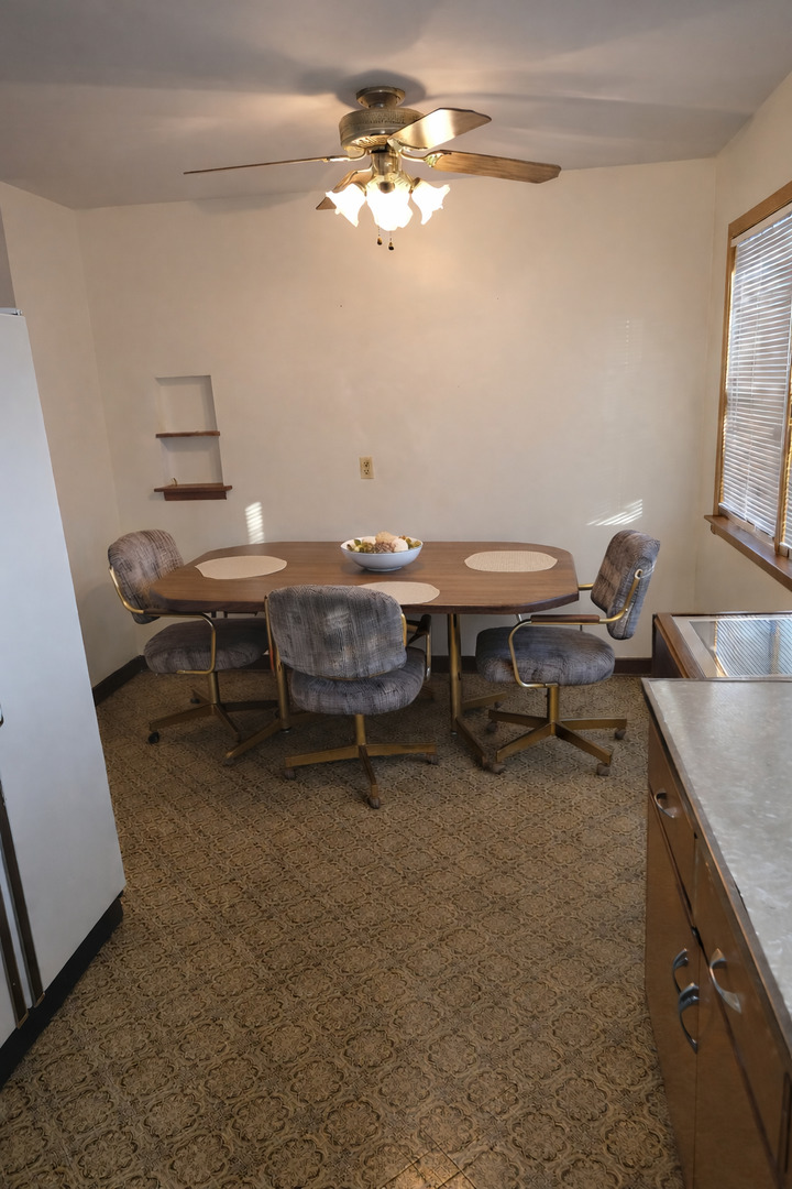 3522 Washington Street Lansing, IL 60438 - Photo 5 of 12 a view of a room with furniture and chandelier