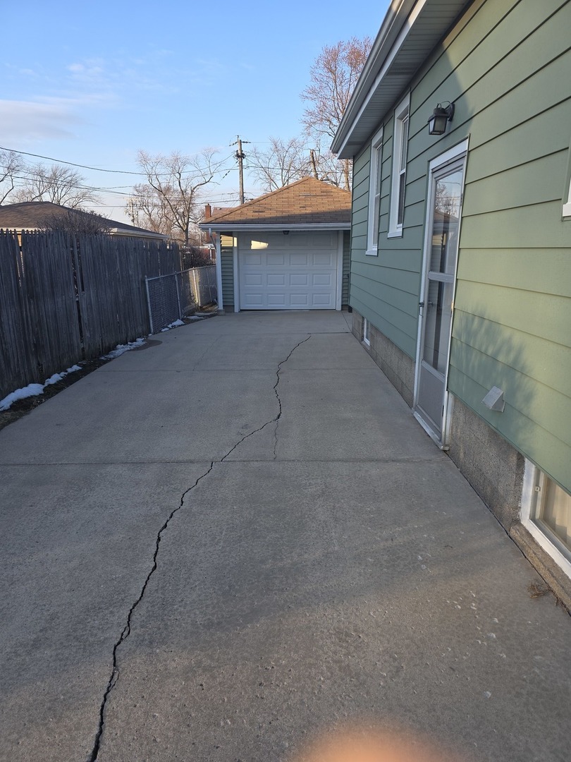 3522 Washington Street Lansing, IL 60438 - Photo 10 of 12 a house view with a backyard space