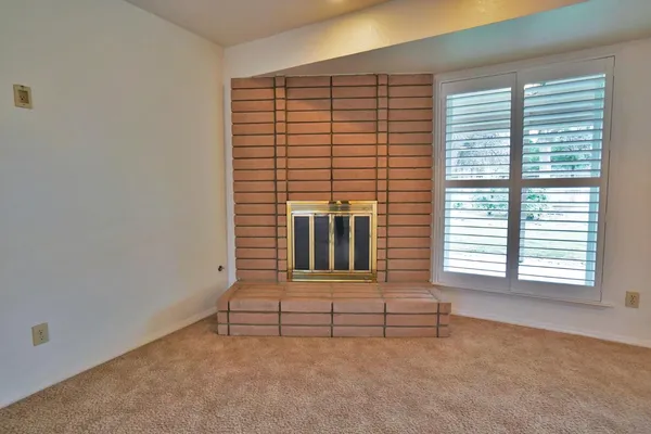 a kitchen with a sink and a microwave