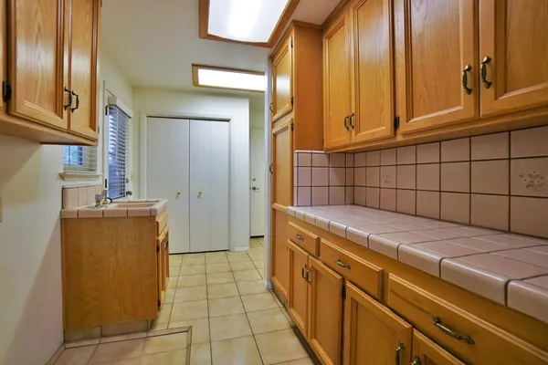 a view of an empty room with windows