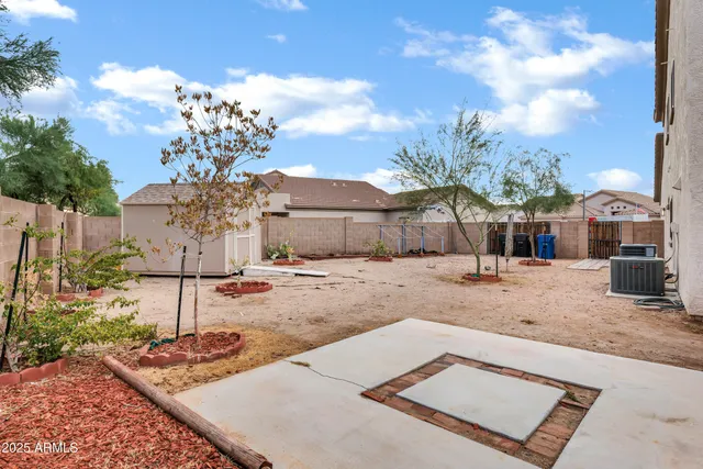 a view of a house with a snow in the yard