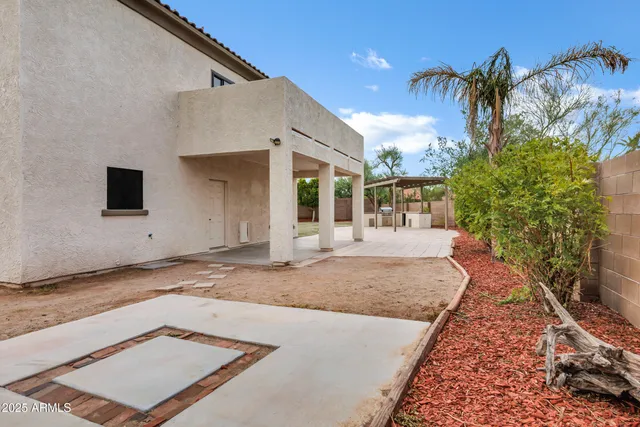 a view of a house with a patio