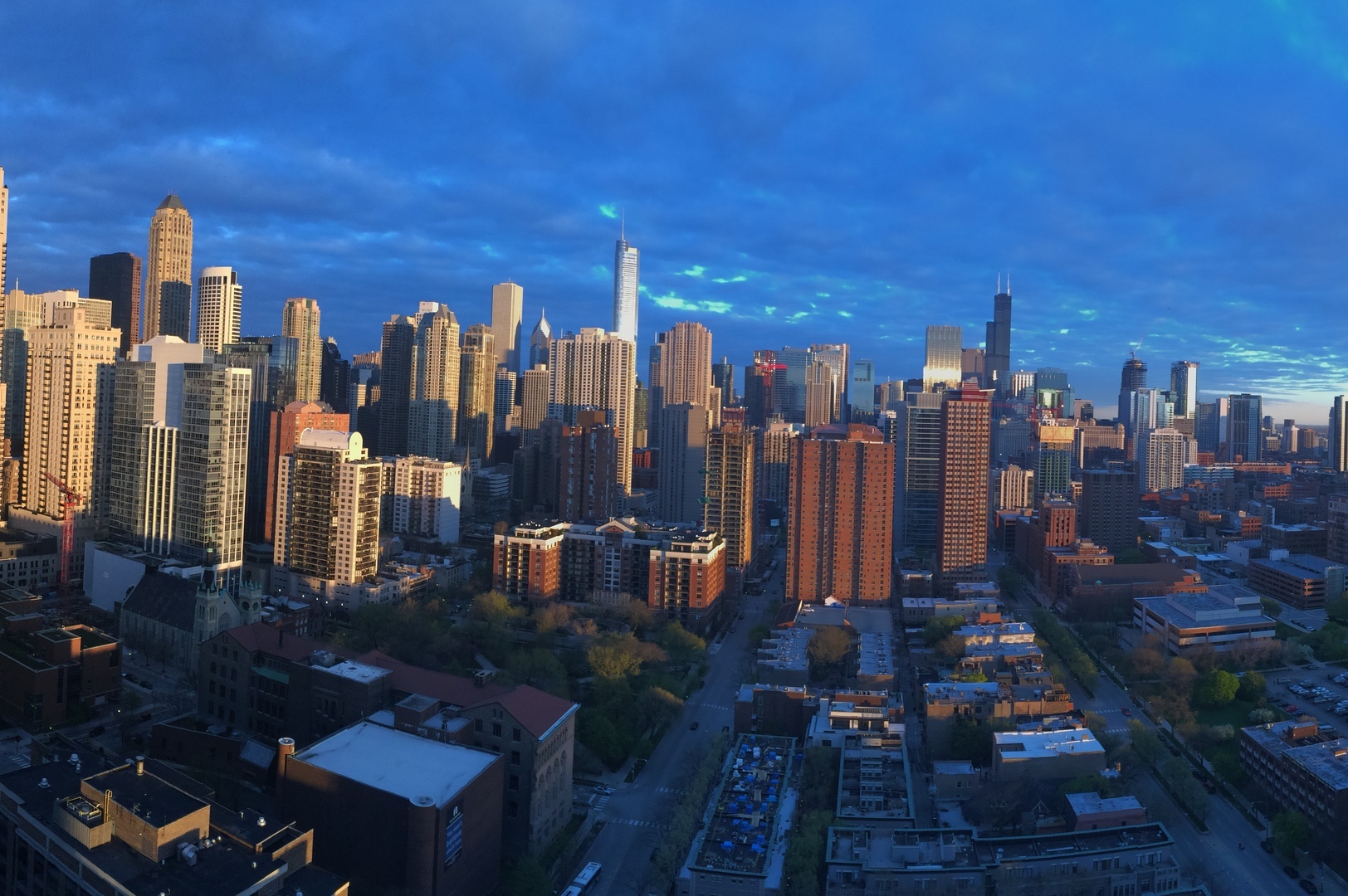 111 West Maple Street, Unit 3112 Chicago, IL 60610 - Photo 16 of 18 a view of a city with tall buildings