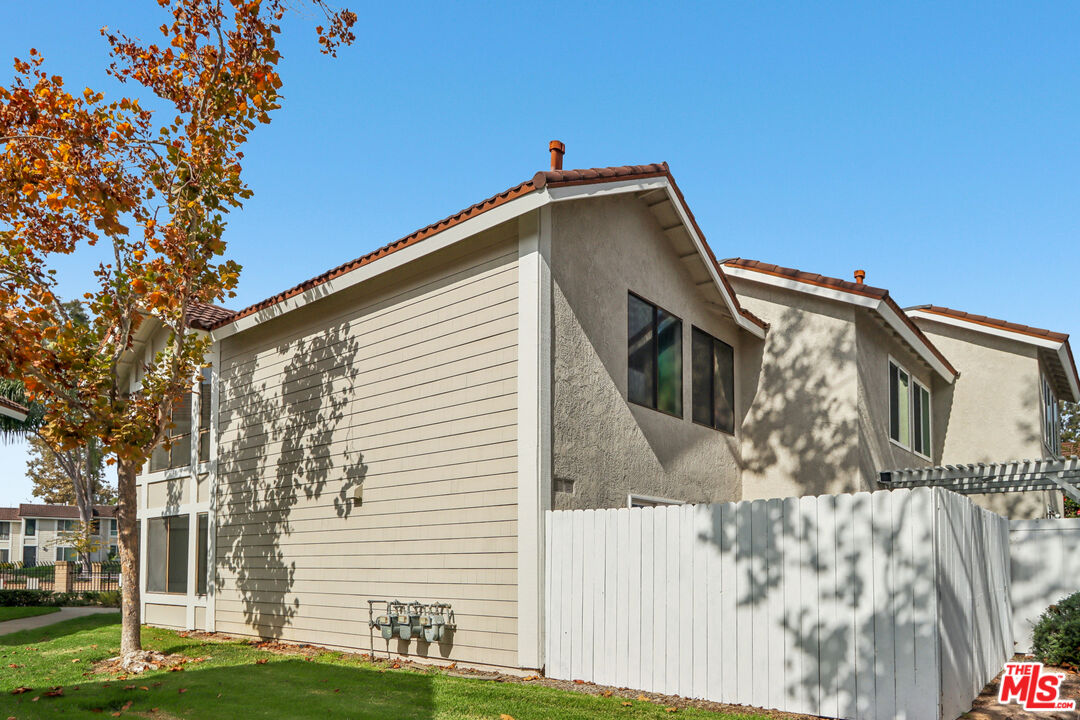 25885 Trabuco Road, Unit 226 Lake Forest, CA 92630 - Photo 7 of 23 a front view of a house with a yard