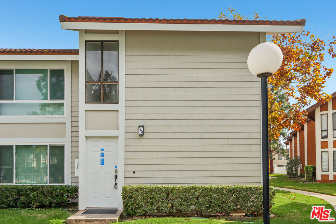25885 Trabuco Road, Unit 226 Lake Forest, CA 92630 - Photo 8 of 23 a front view of a house with garden
