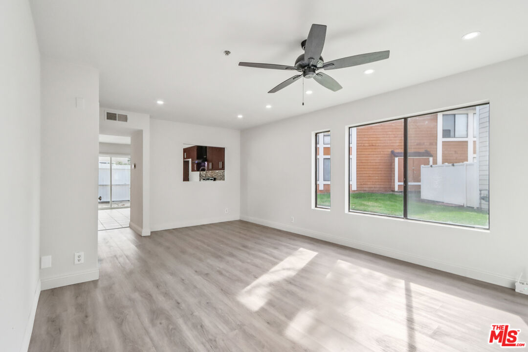 25885 Trabuco Road, Unit 226 Lake Forest, CA 92630 - Photo 10 of 23 a view of an empty room with a window
