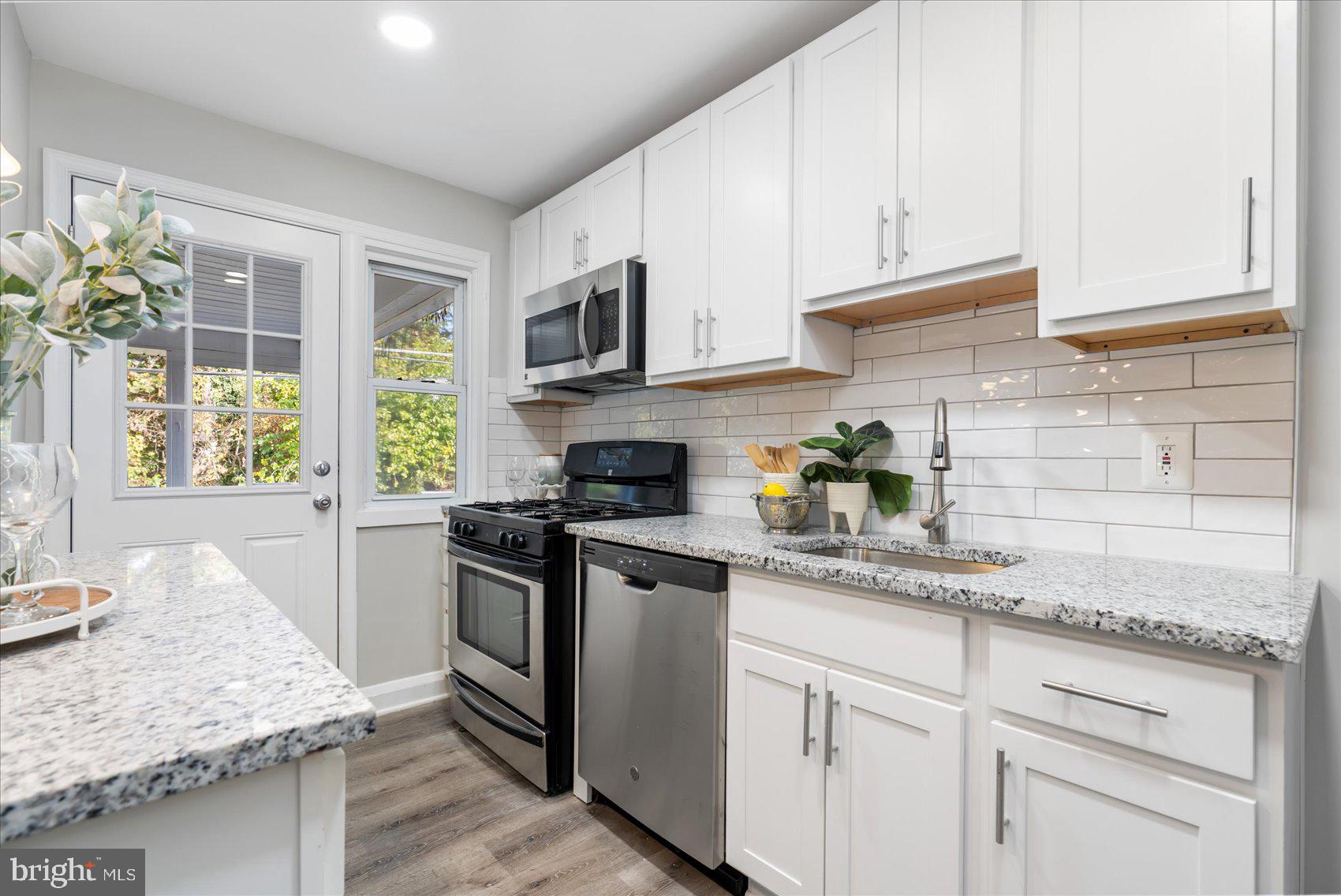 1210 Elm Road Baltimore, MD 21227 - Photo 14 of 43 Kitchen With Stainless Steel Appliances