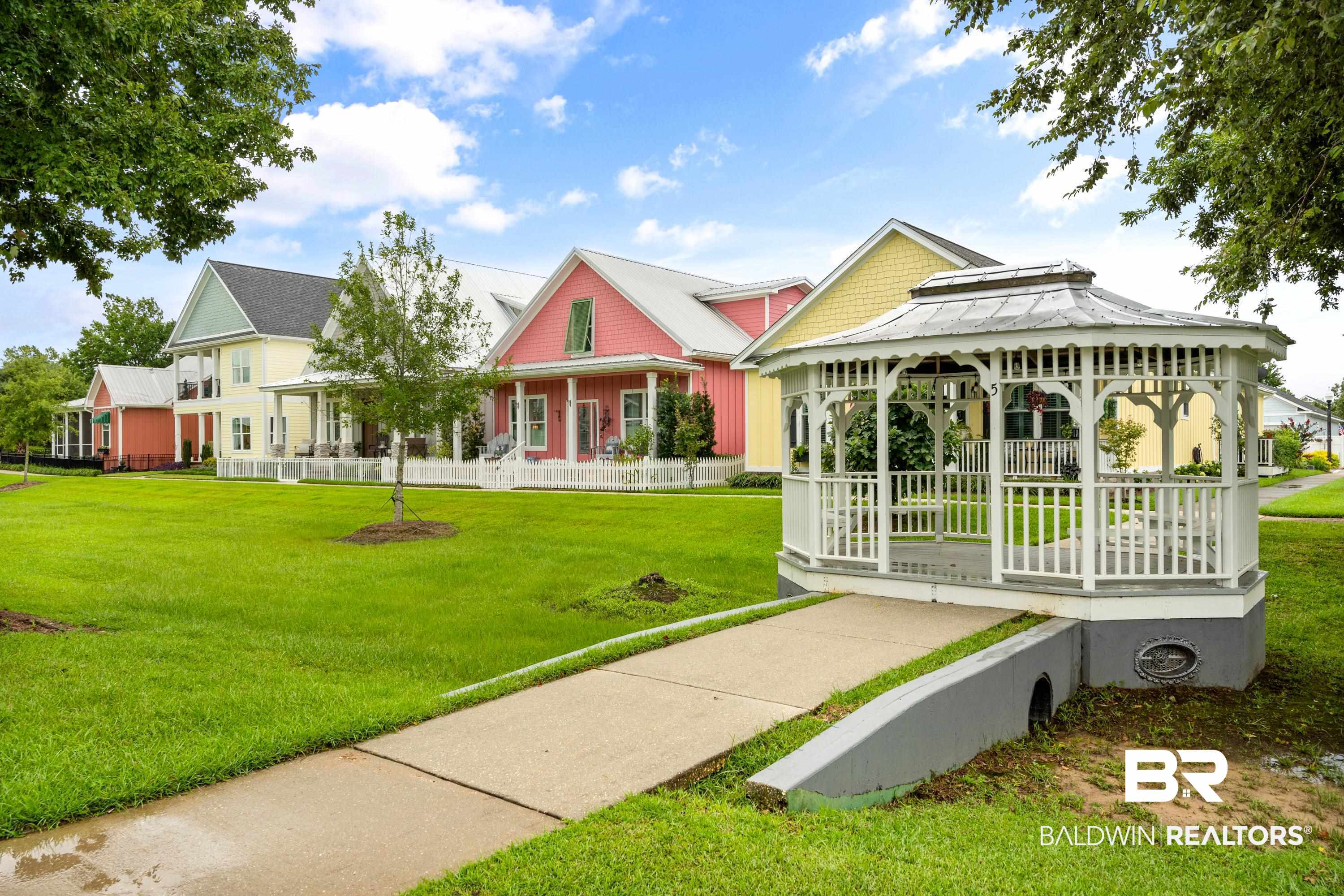1113 Yellow Daisy Lane Foley, AL 36535 - Photo 5 of 35 View of community with a yard and a gazebo