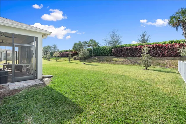 a view of a golf course with a big yard