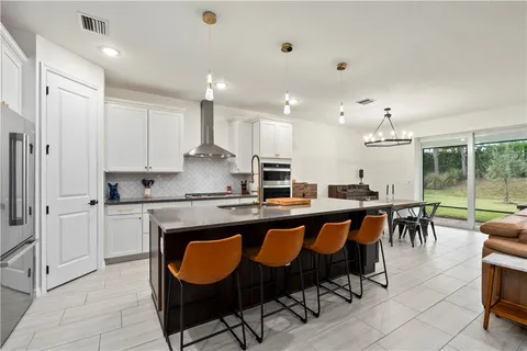 $599,999 | 12360 Southwest Myrtle Oak Drive, Port St. Lucie, FL 34987