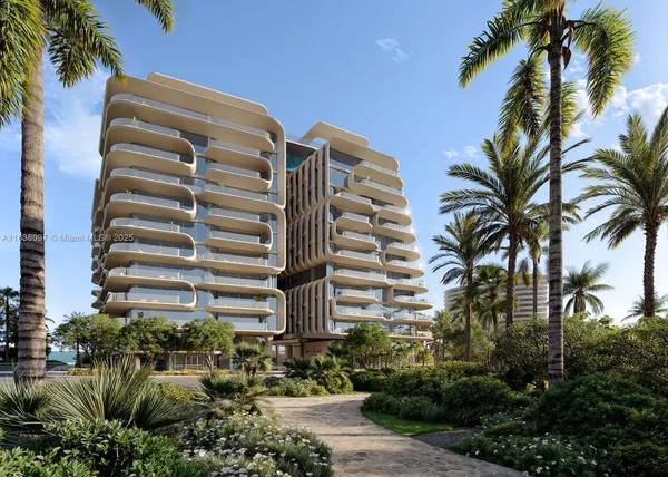 a front view of multi story residential apartment building with yard and parking space