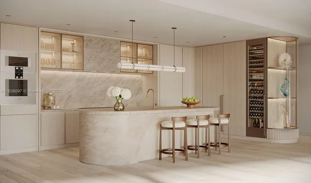 a view of a kitchen with furniture and wooden floor