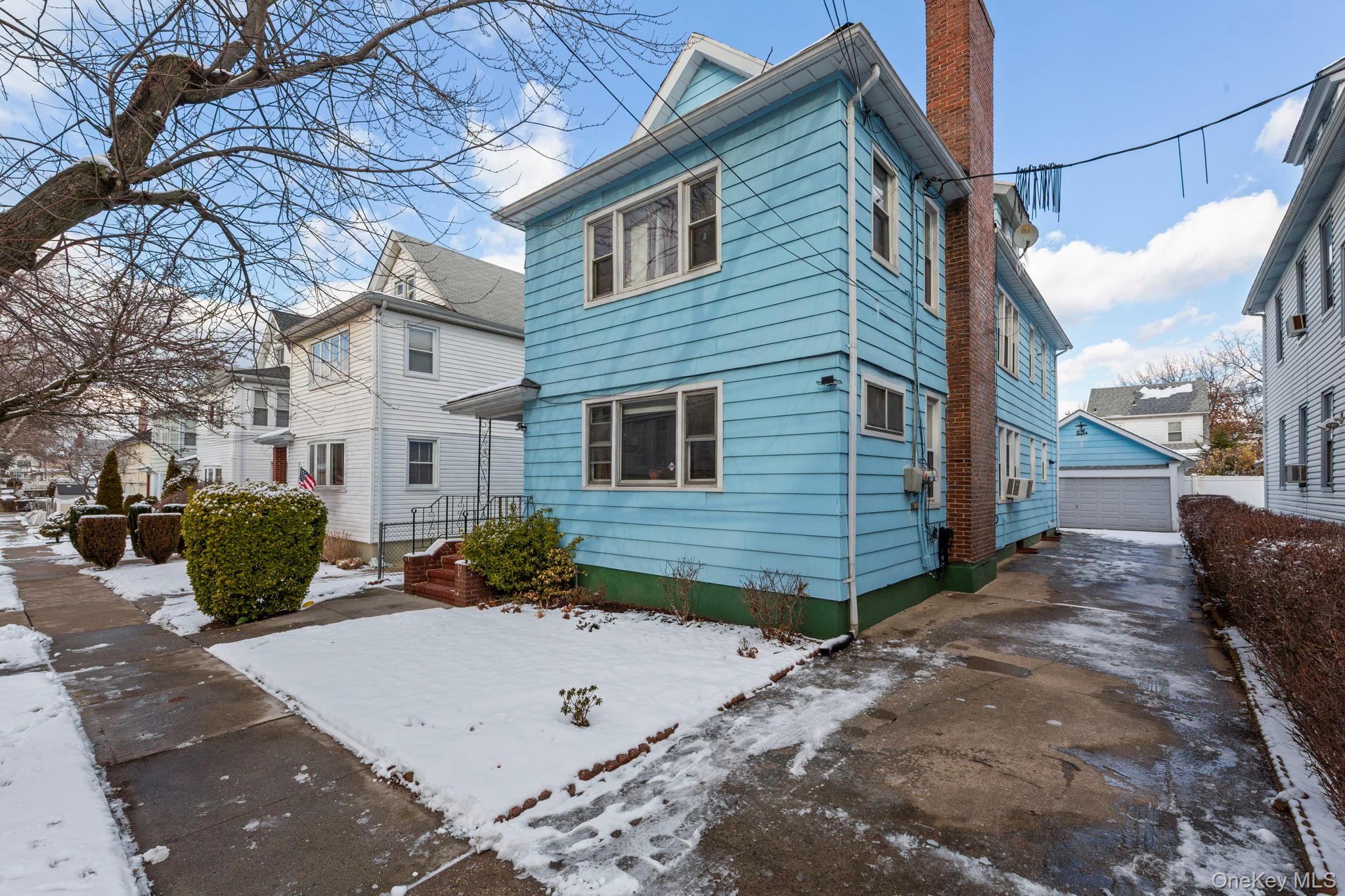 92-69 220th Street Queens, NY 11428 - Photo 2 of 33 a view of a house with a yard