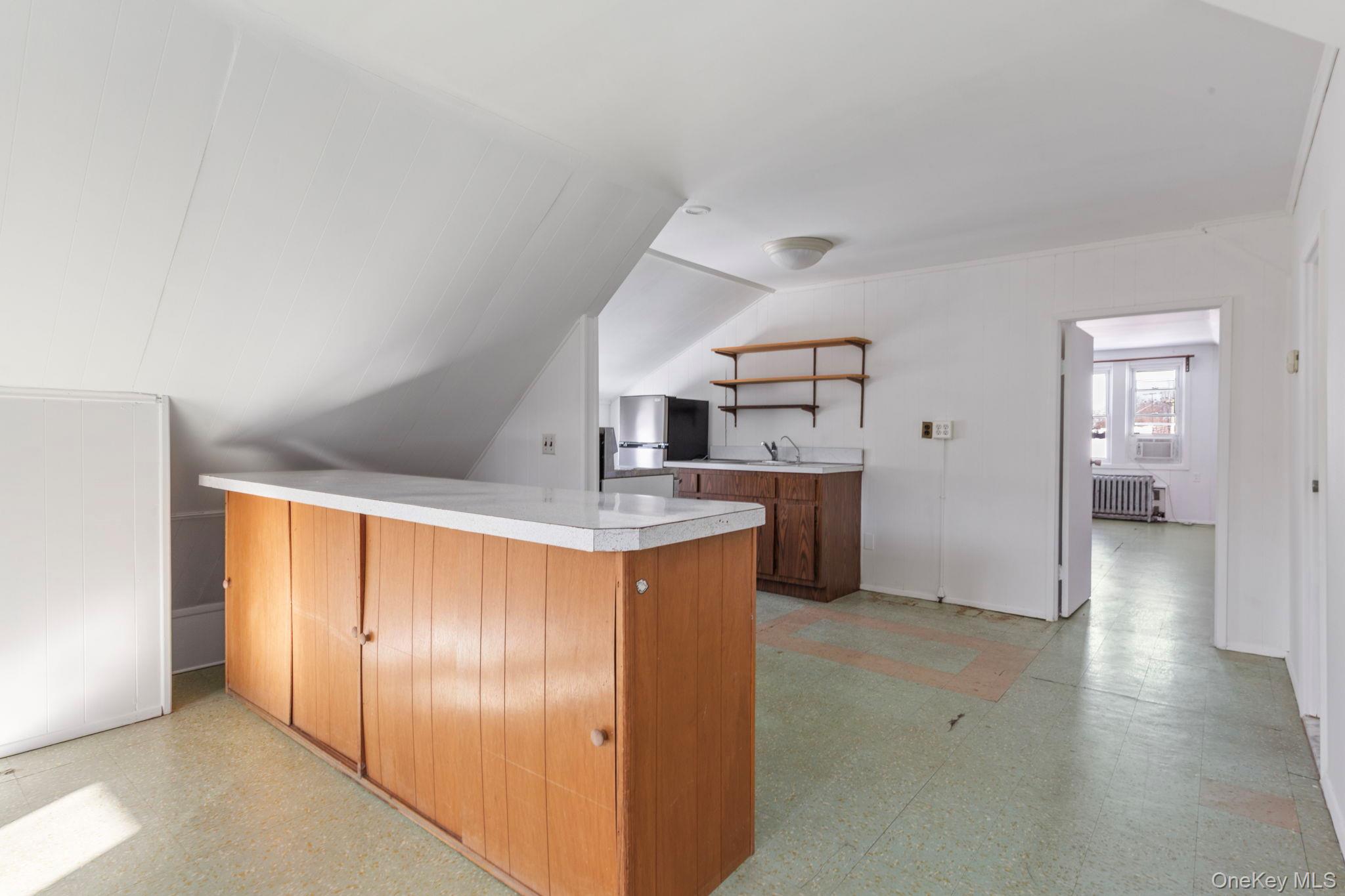 92-69 220th Street Queens, NY 11428 - Photo 21 of 33 a view of a kitchen with a sink