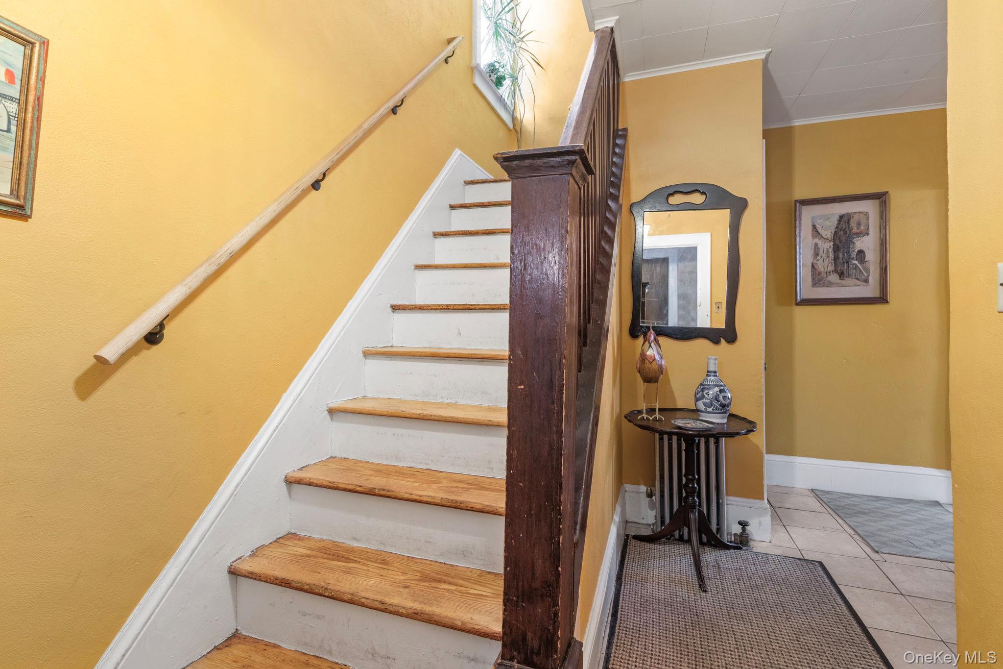 92-69 220th Street Queens, NY 11428 - Photo 3 of 33 a view of entryway and hall with wooden floor