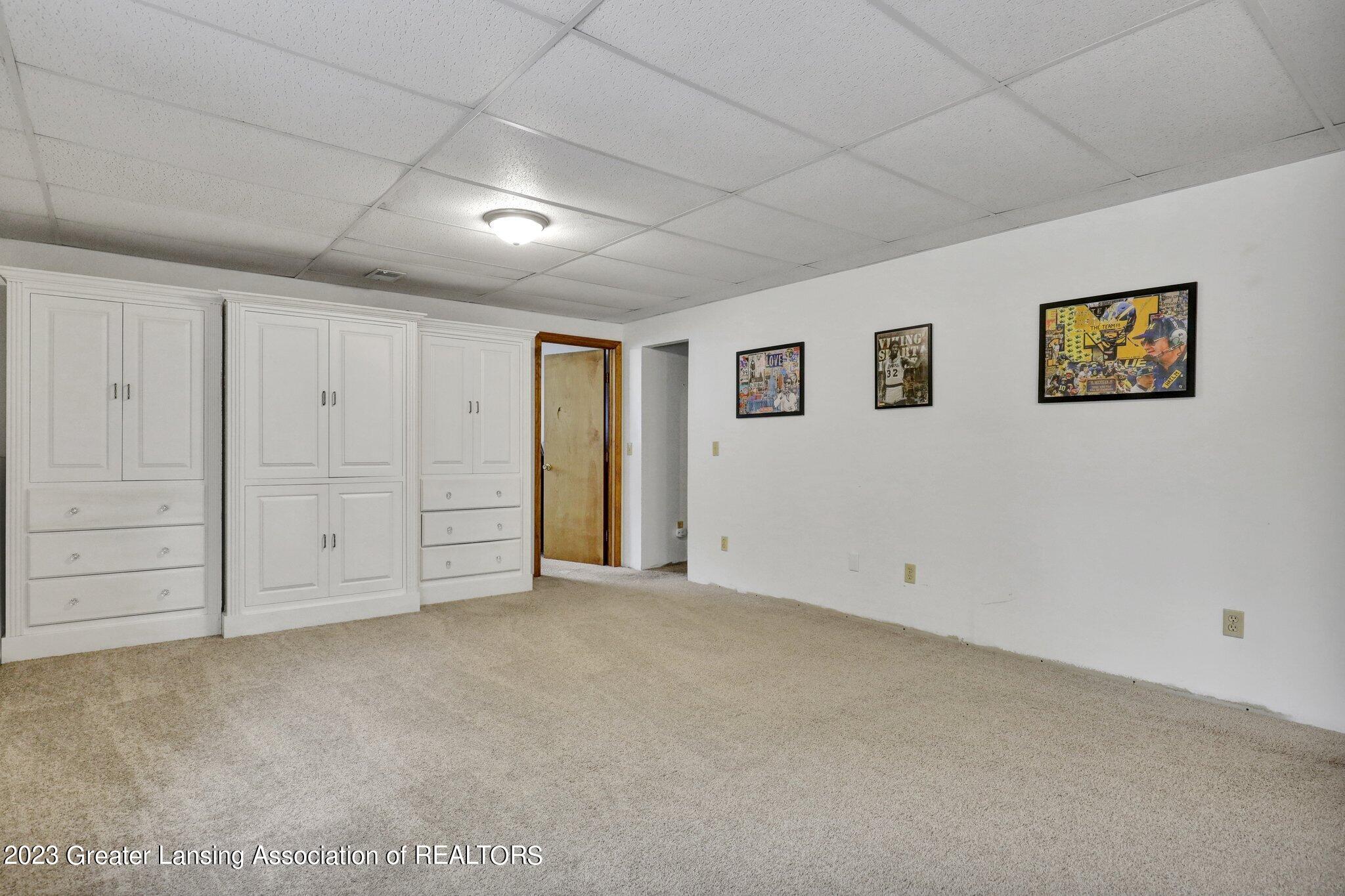 5975 Horstmeyer Road Lansing, MI 48911 - Photo 26 of 43 basement living