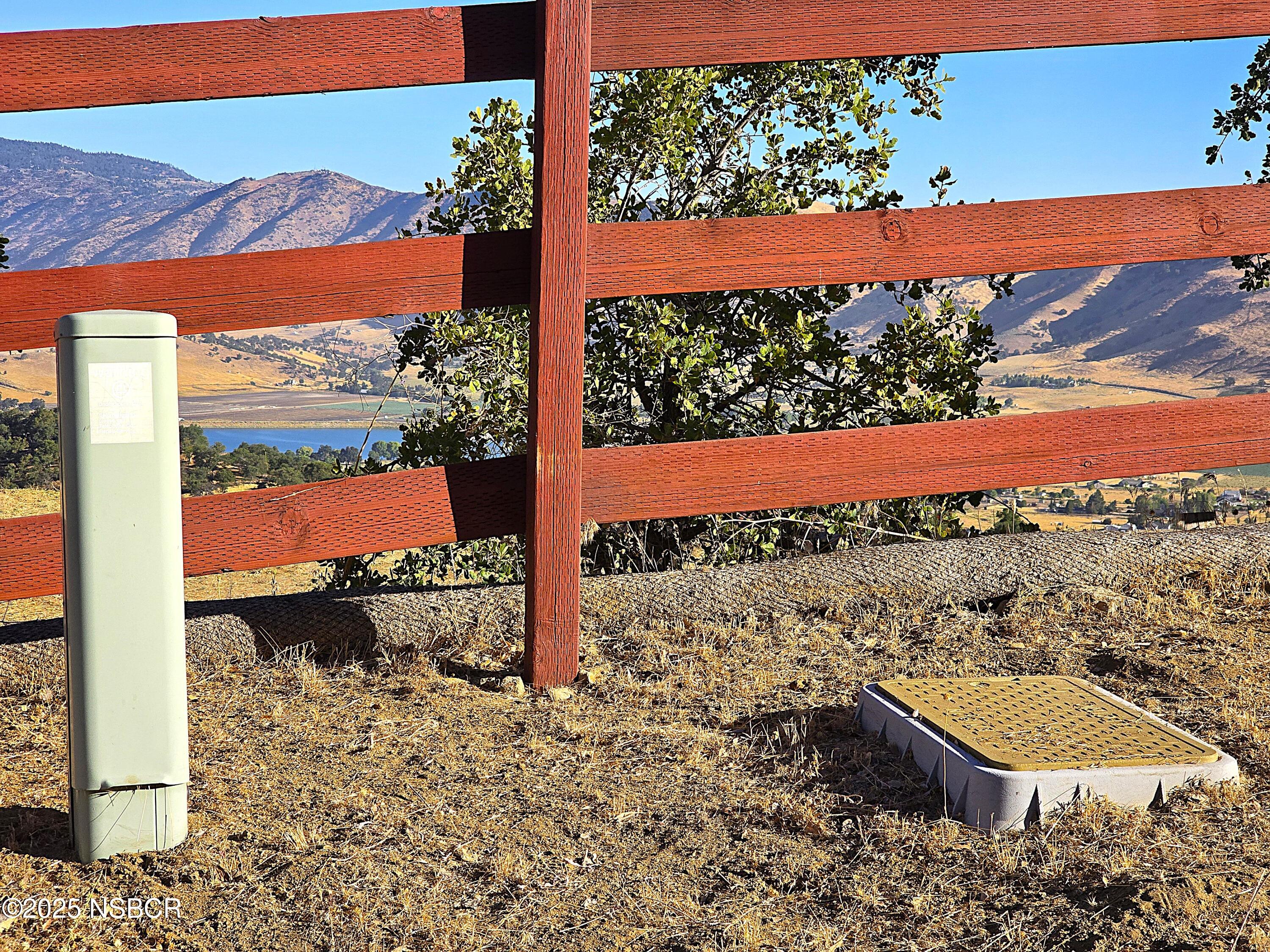 0 Zurich Drive Tehachapi, CA 93561 - Photo 11 of 52 a view of a small yard with wooden fence