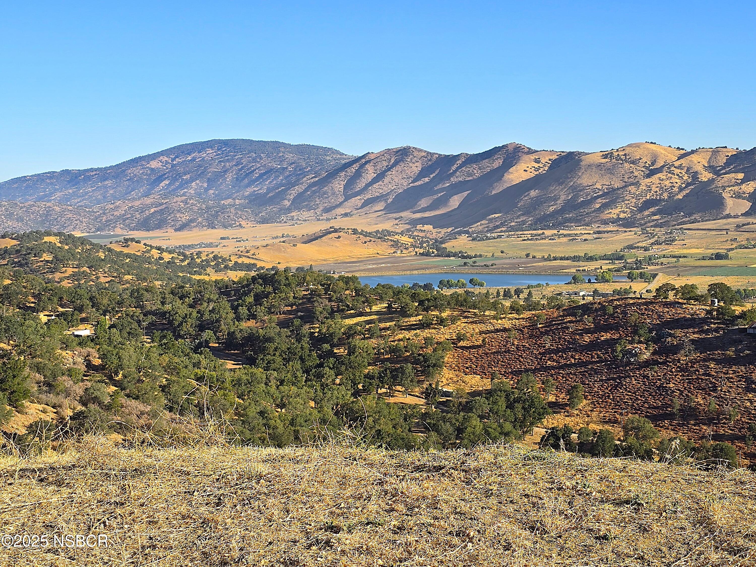 0 Zurich Drive Tehachapi, CA 93561 - Photo 19 of 52 a view of a field with mountains in the background