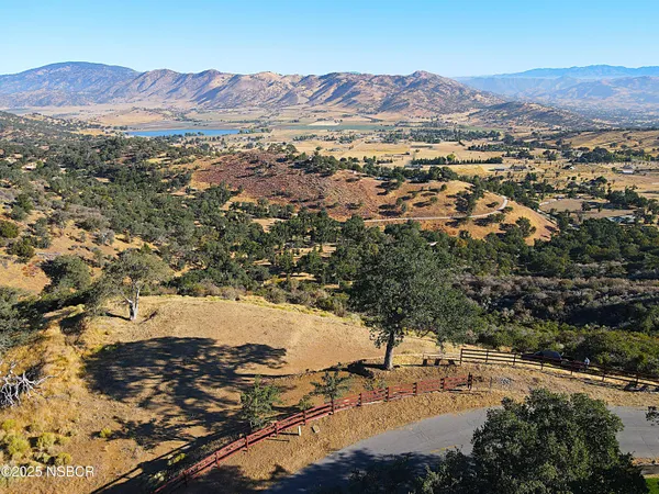 a view of ocean with mountain