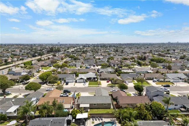an aerial view of residential building with city view