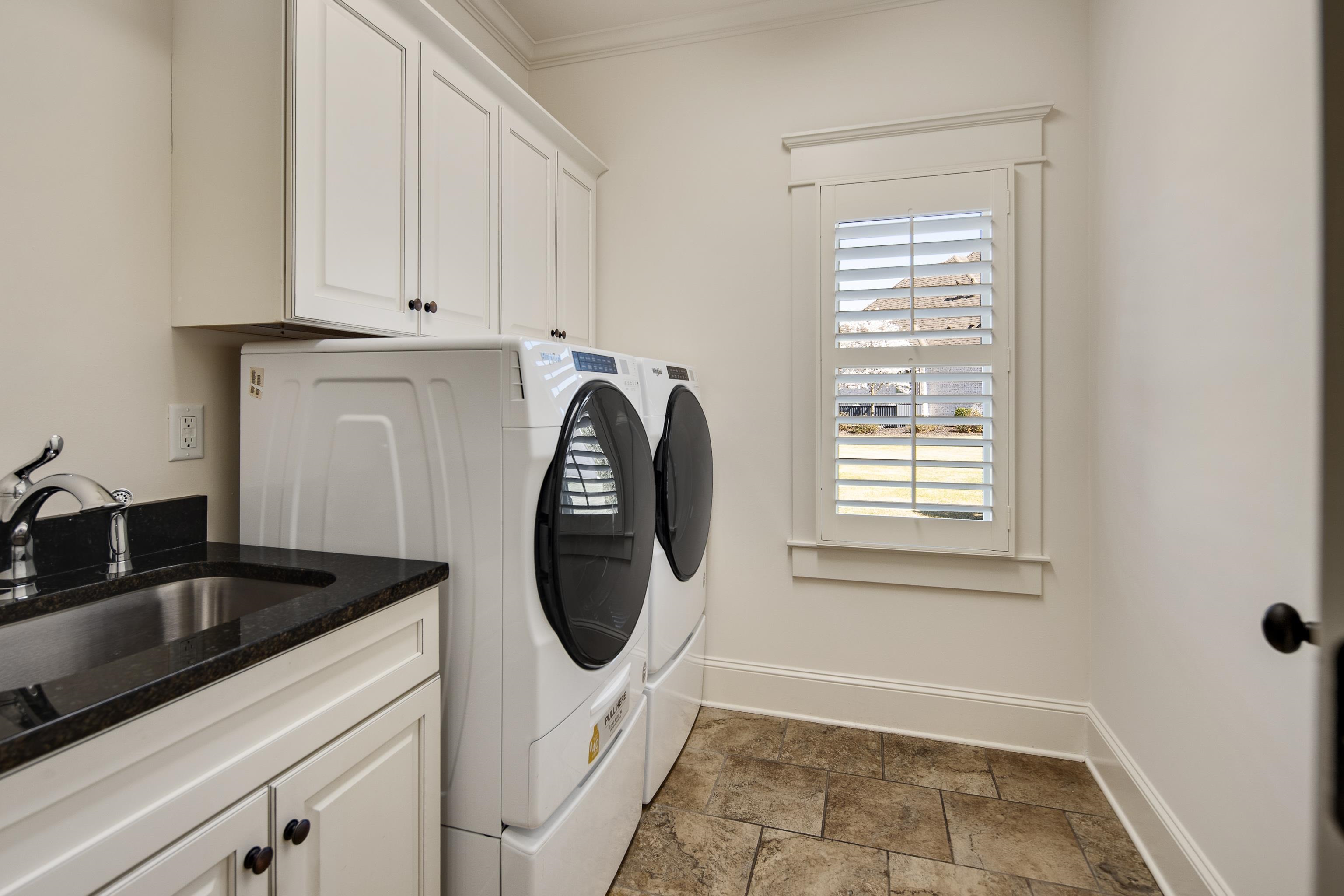 9110 Baynard Loop North Germantown, TN 38139 - Photo 17 of 40 a kitchen with a sink and a window