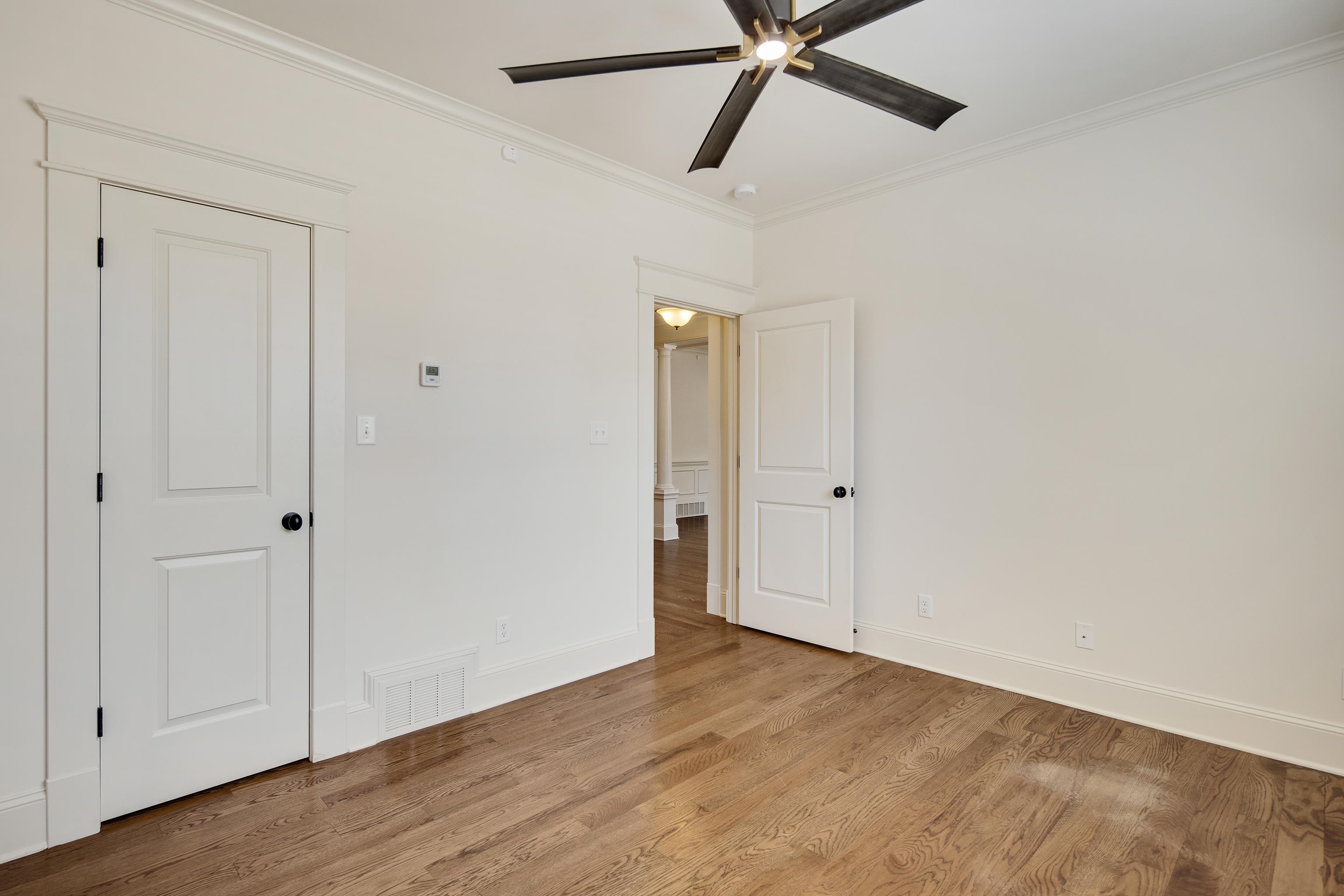 9110 Baynard Loop North Germantown, TN 38139 - Photo 19 of 40 a view of a room with wooden floor and white walls