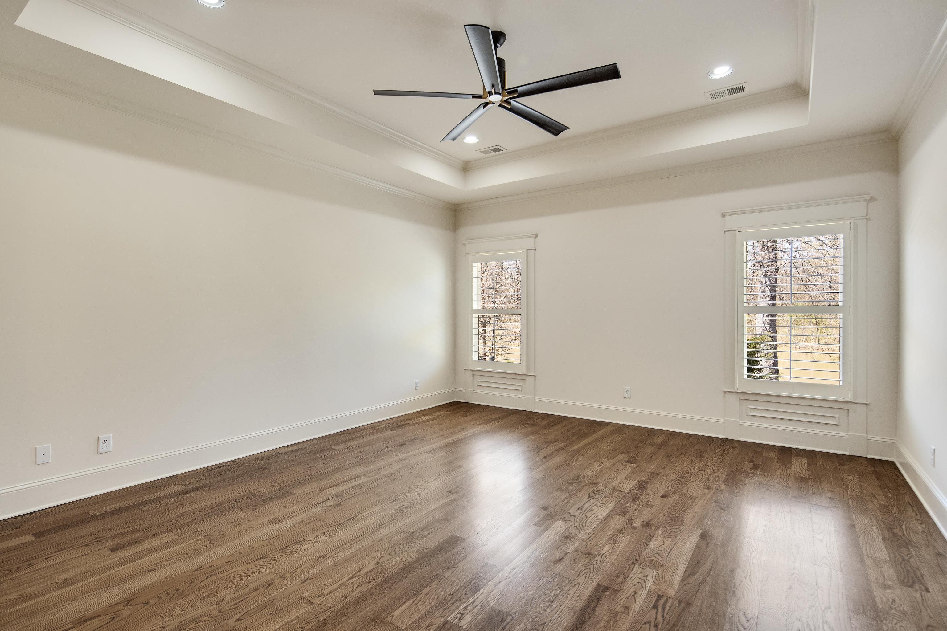 9110 Baynard Loop North Germantown, TN 38139 - Photo 21 of 40 a view of empty room with wooden floor and fan