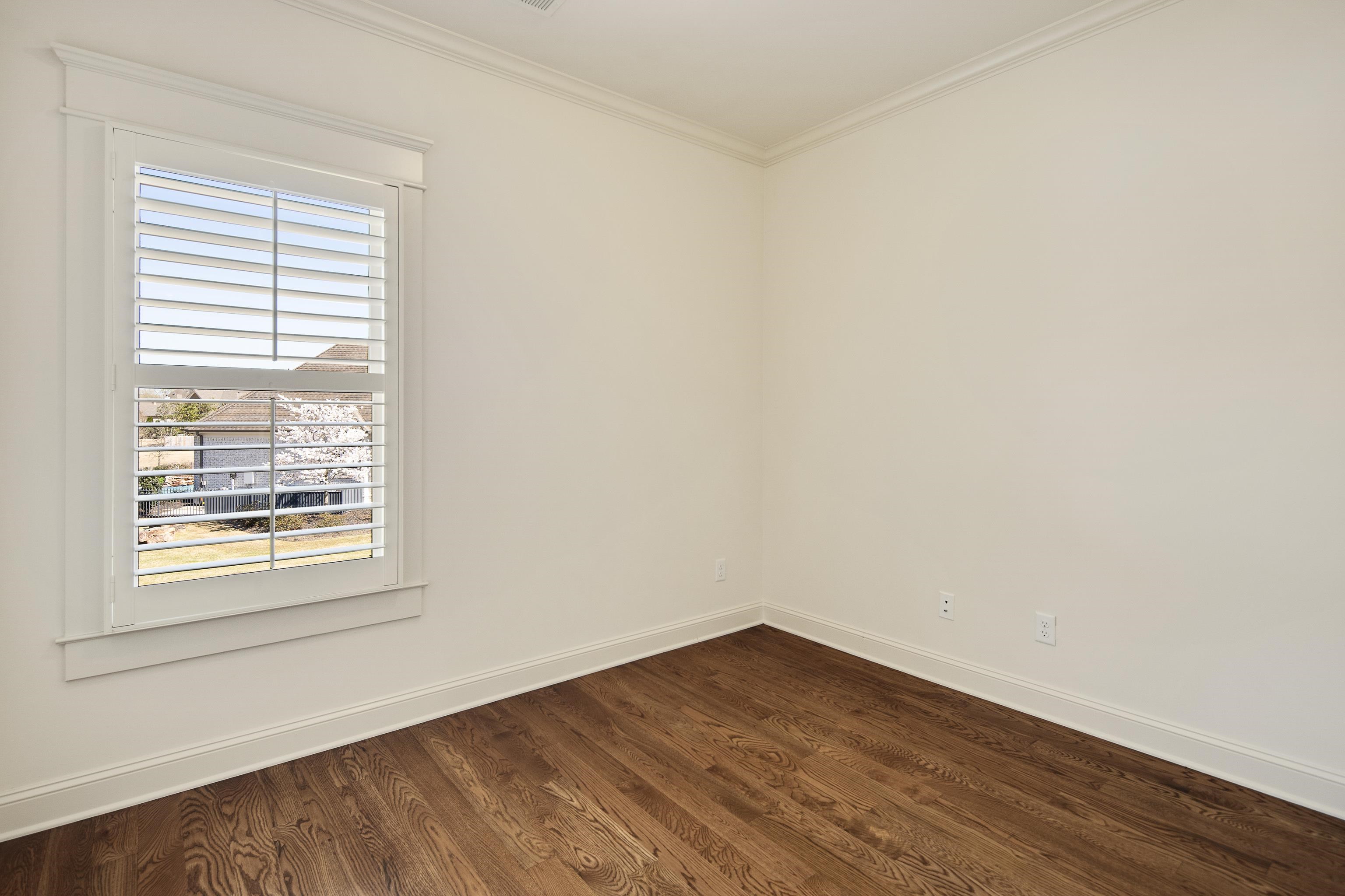 9110 Baynard Loop North Germantown, TN 38139 - Photo 25 of 40 an empty room with wooden floor and windows