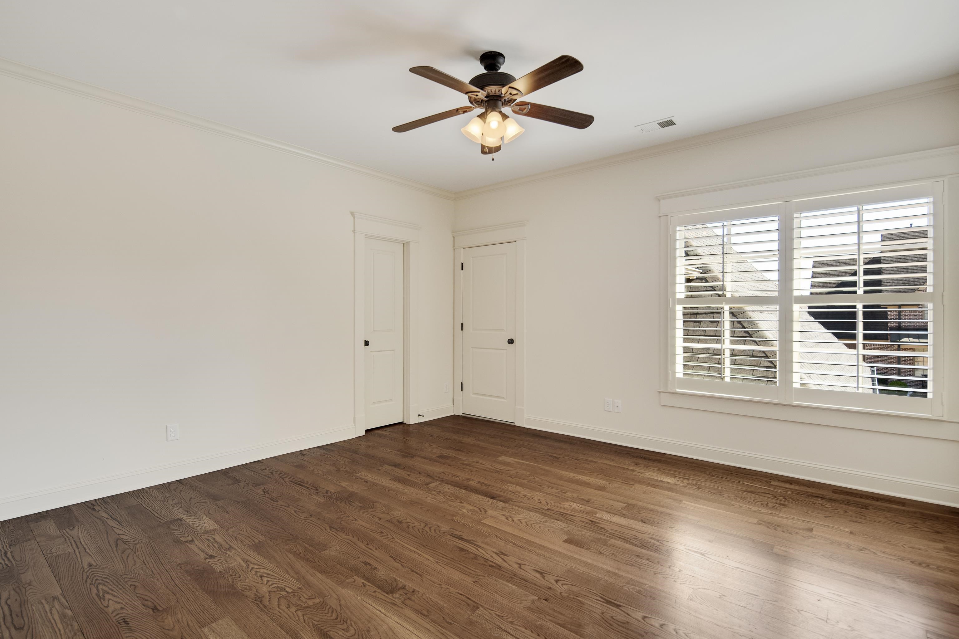 9110 Baynard Loop North Germantown, TN 38139 - Photo 26 of 40 wooden floor in an empty room with a window