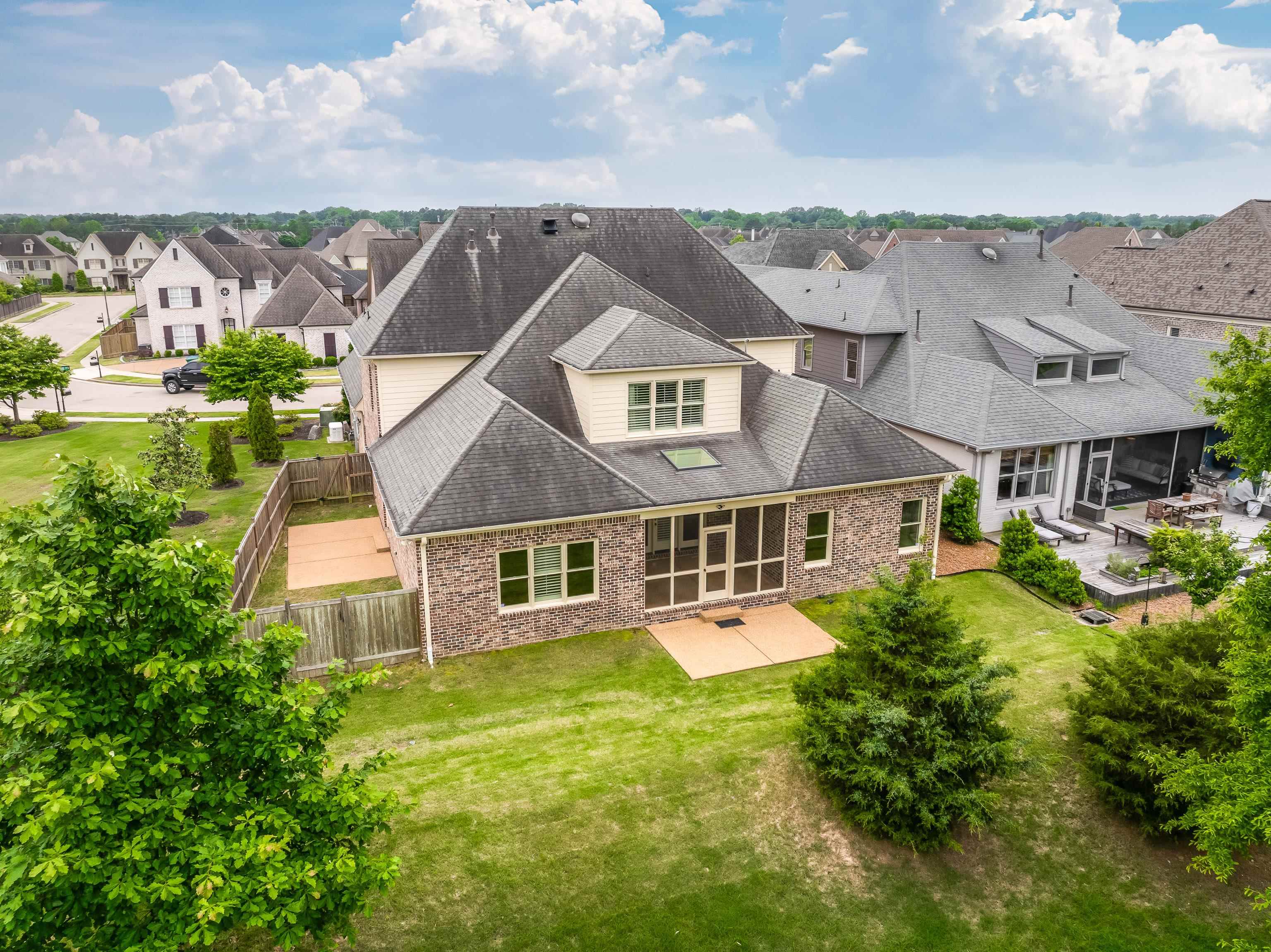 9110 Baynard Loop North Germantown, TN 38139 - Photo 37 of 40 an aerial view of a house with a garden and lake view