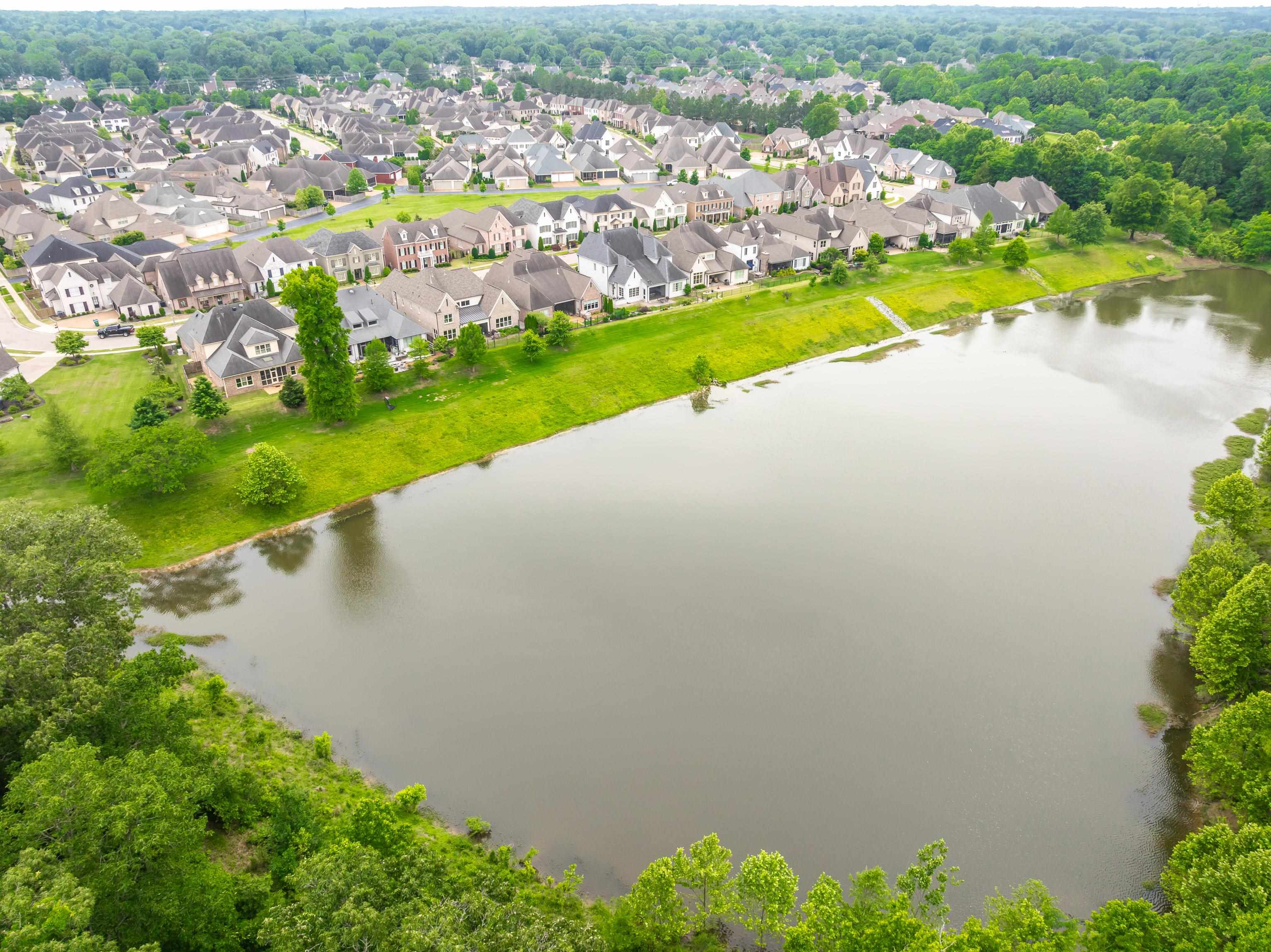 9110 Baynard Loop North Germantown, TN 38139 - Photo 38 of 40 an aerial view of a house with a yard and lake view