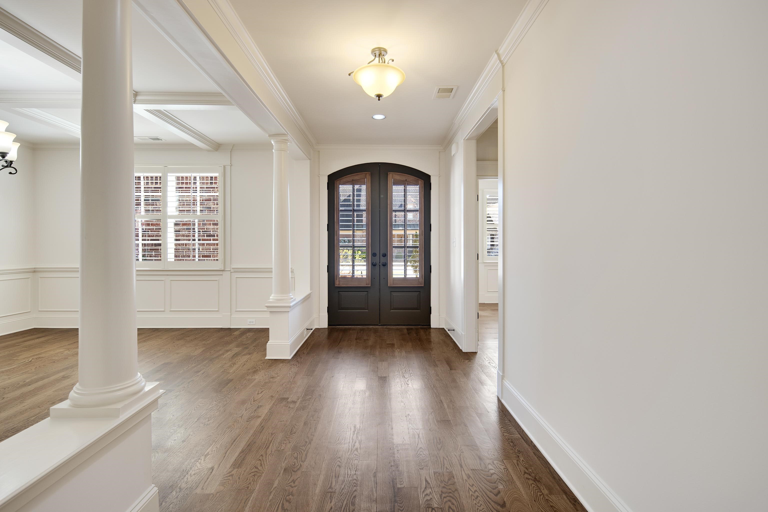 9110 Baynard Loop North Germantown, TN 38139 - Photo 5 of 40 an empty room with wooden floor and windows