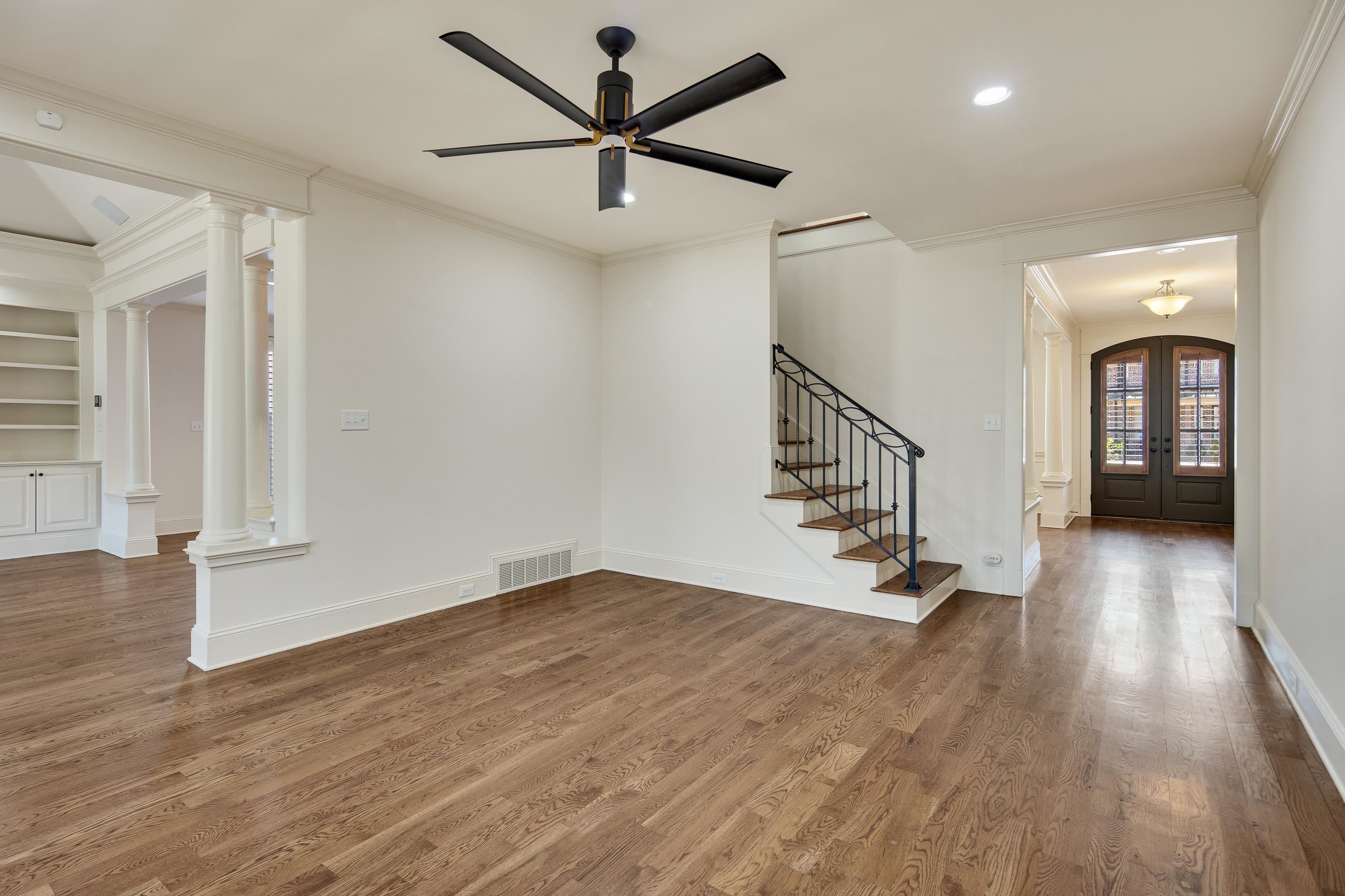 9110 Baynard Loop North Germantown, TN 38139 - Photo 8 of 40 wooden floor in an empty room with a window