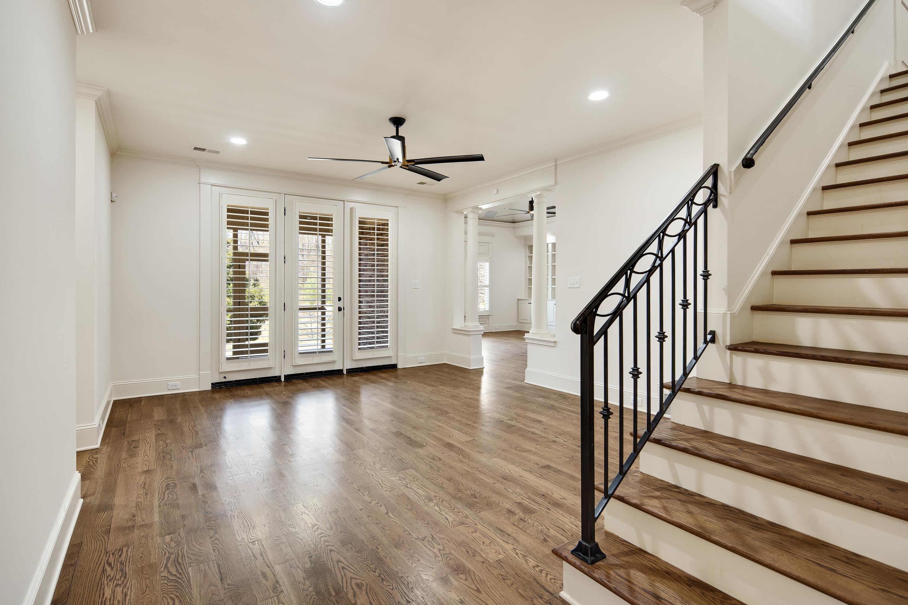 9110 Baynard Loop North Germantown, TN 38139 - Photo 9 of 40 an empty room with wooden floor and windows