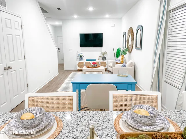 a living room with a couch and a flat screen tv