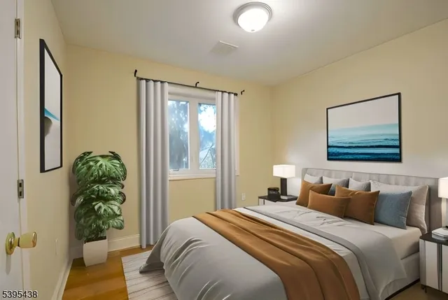 a workspace with furniture and a potted plant