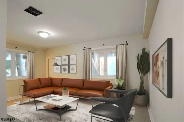 a bathroom with a granite countertop toilet sink and mirror