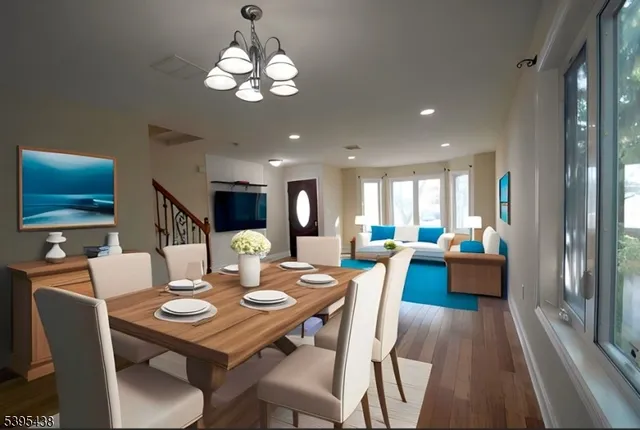 a view of a house with a wooden deck