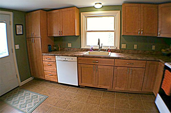 38 Toll Road Salisbury, MA 01952 - Photo 6 of 19 a kitchen with stainless steel appliances granite countertop a stove a sink and a refrigerator