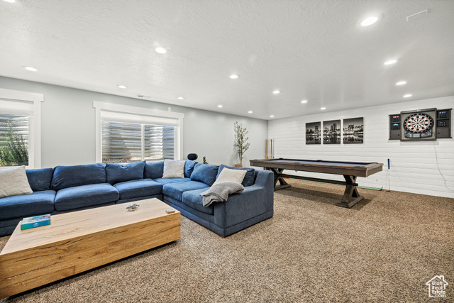 2280 South 450 West Perry, UT 84302 - Photo 24 of 38 Carpeted living area with billiards, a textured ceiling, and recessed lighting