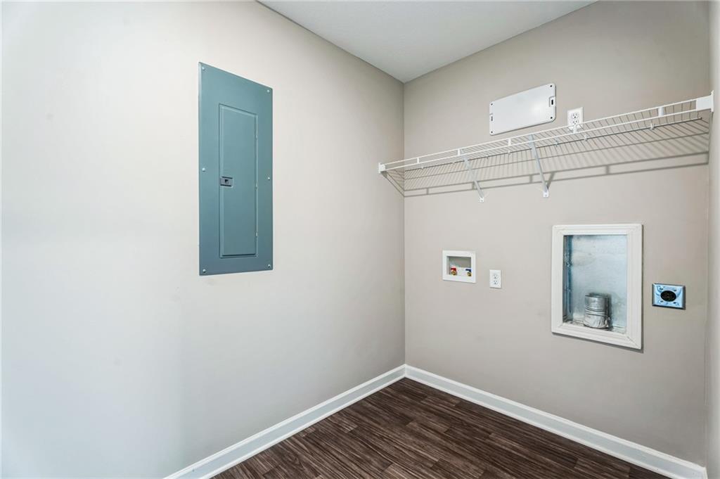 23 Whiterock Road Phenix City, AL 36869 - Photo 14 of 29 Laundry room with electric dryer hookup, electric panel, baseboards, laundry area, and washer hookup