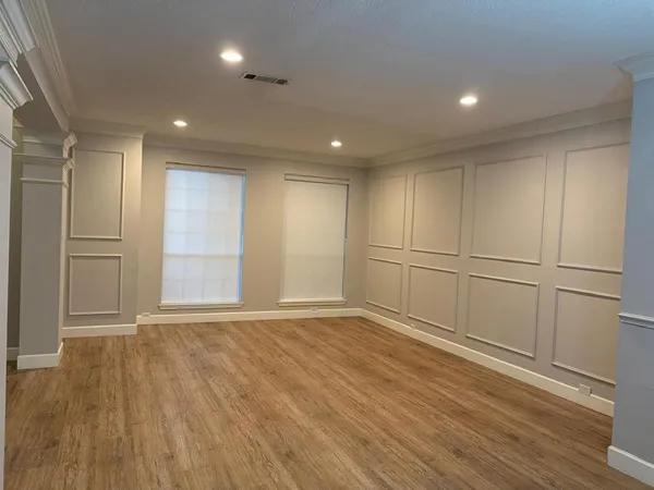 a bed room with a bed and a television