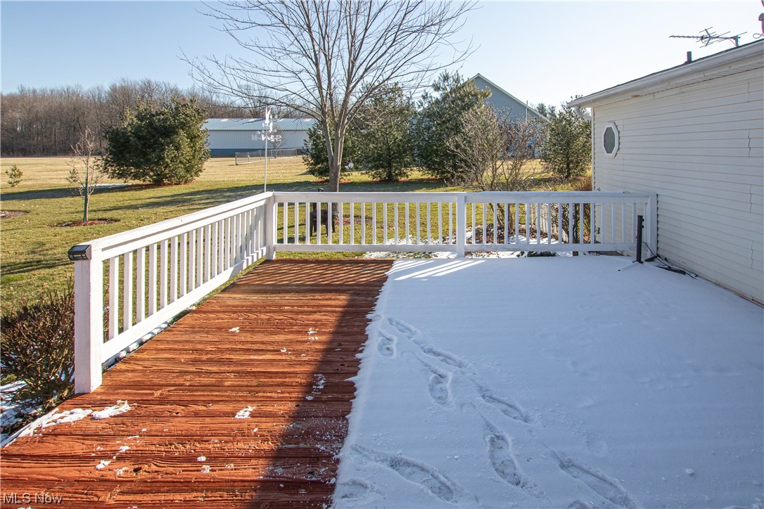 9459 Stone Road Litchfield, OH 44253 - Photo 30 of 50 Wooden deck with a yard