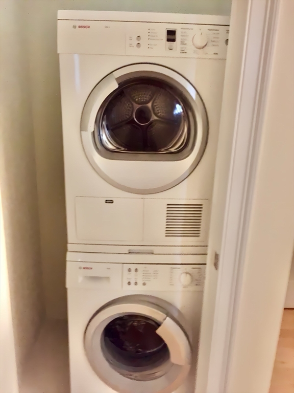 20 Chapel Street, Unit C308 Brookline, MA 02446 - Photo 11 of 15 a utility room with dryer and washer