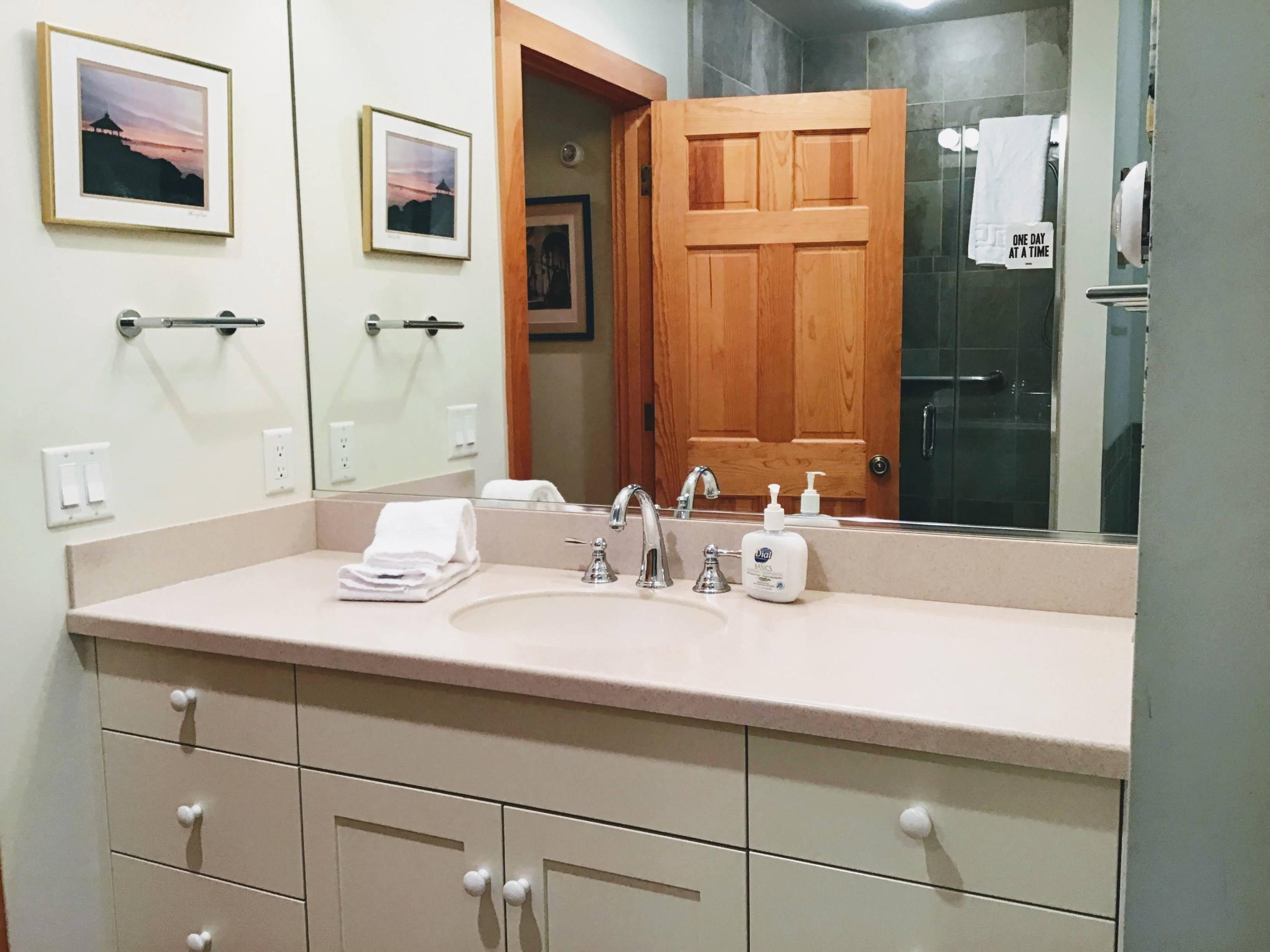 150 Tonset Road Orleans, MA 02653 - Photo 26 of 54 a bathroom with a sink and a mirror