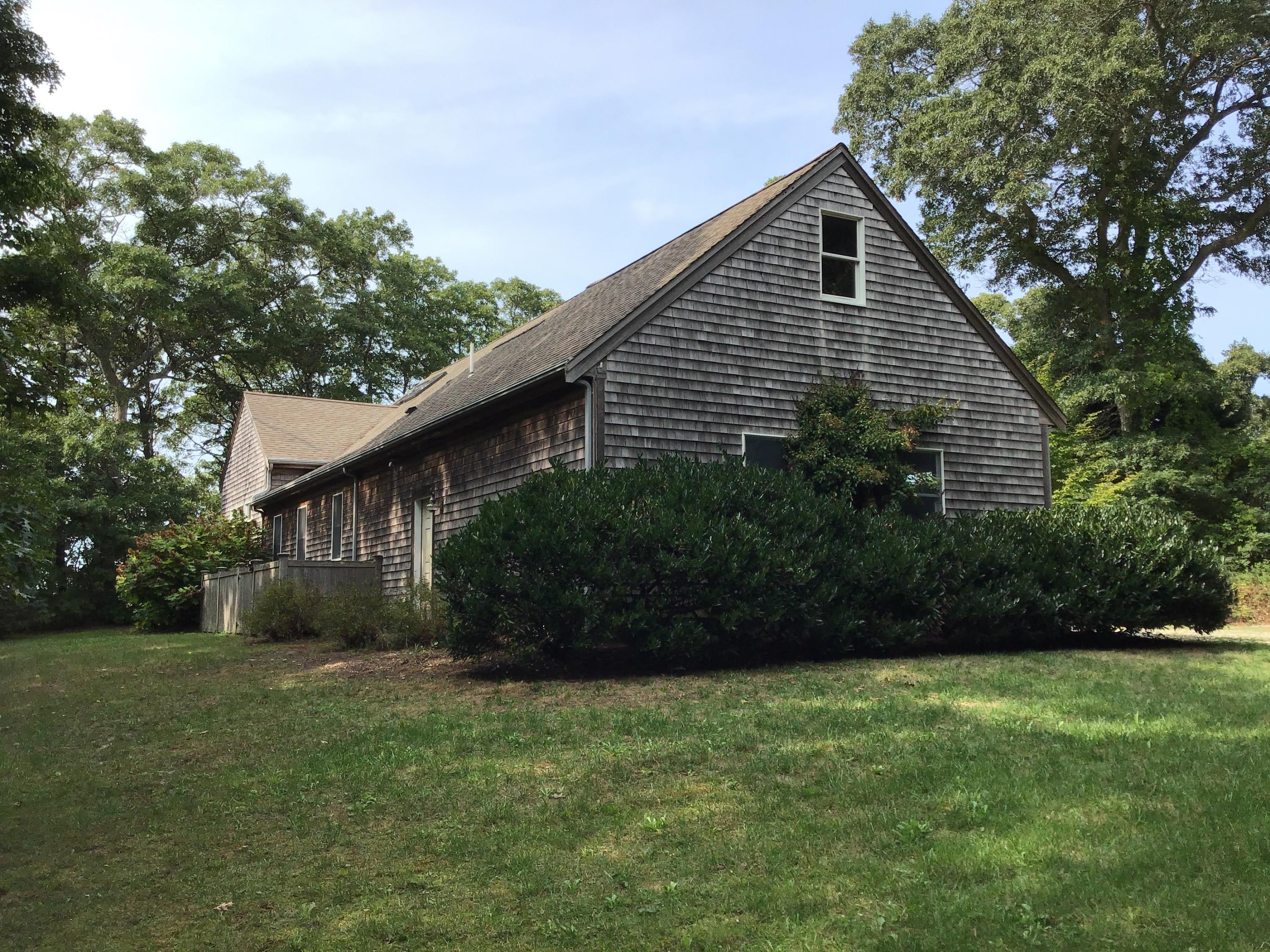 150 Tonset Road Orleans, MA 02653 - Photo 49 of 54 a front view of house with a garden