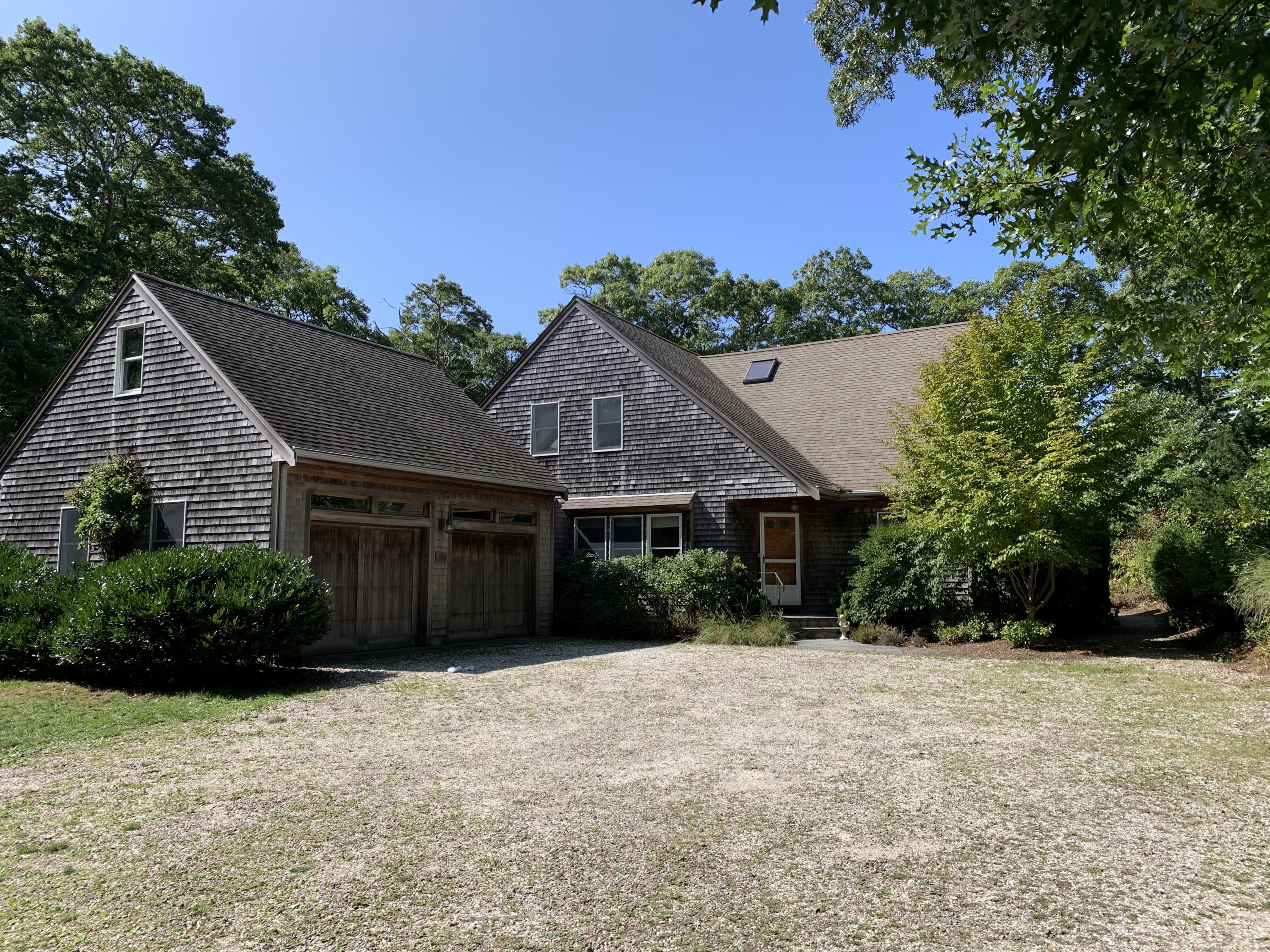 150 Tonset Road Orleans, MA 02653 - Photo 5 of 54 a house view with a garden space