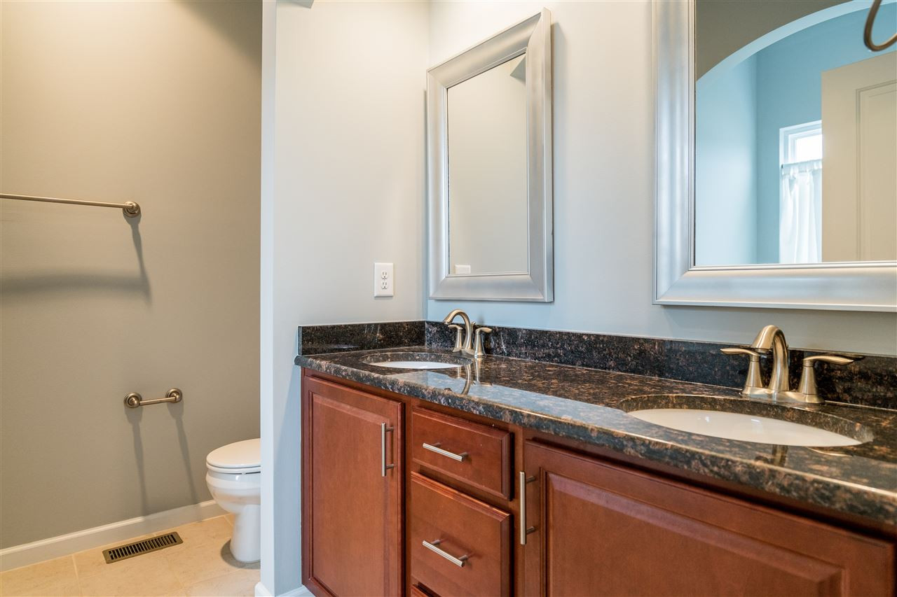 1539 Rodessa Run Raleigh, NC 27607 - Photo 19 of 25 Huge master bathroom features a double vanity and granite counter tops. Enjoy the separate shower next to the garden tub. Master Bathroom