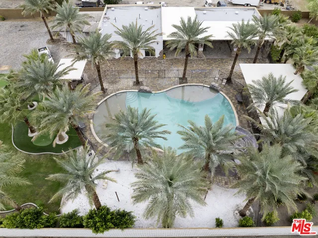 a view of a swimming pool with a chair