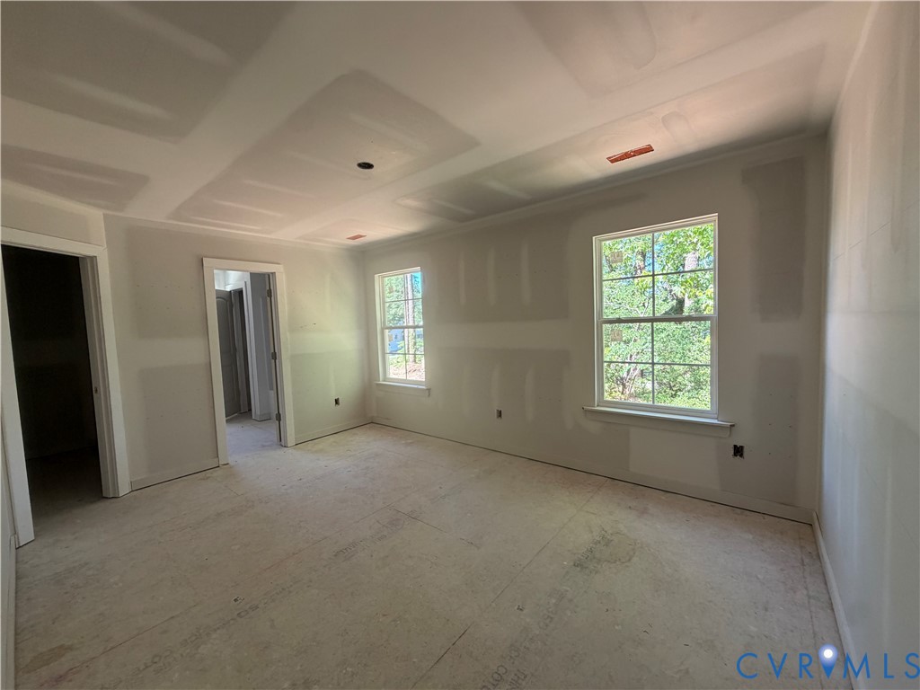 21305 Rutledge Avenue Petersburg, VA 23803 - Photo 7 of 14 a view of an empty room with a window